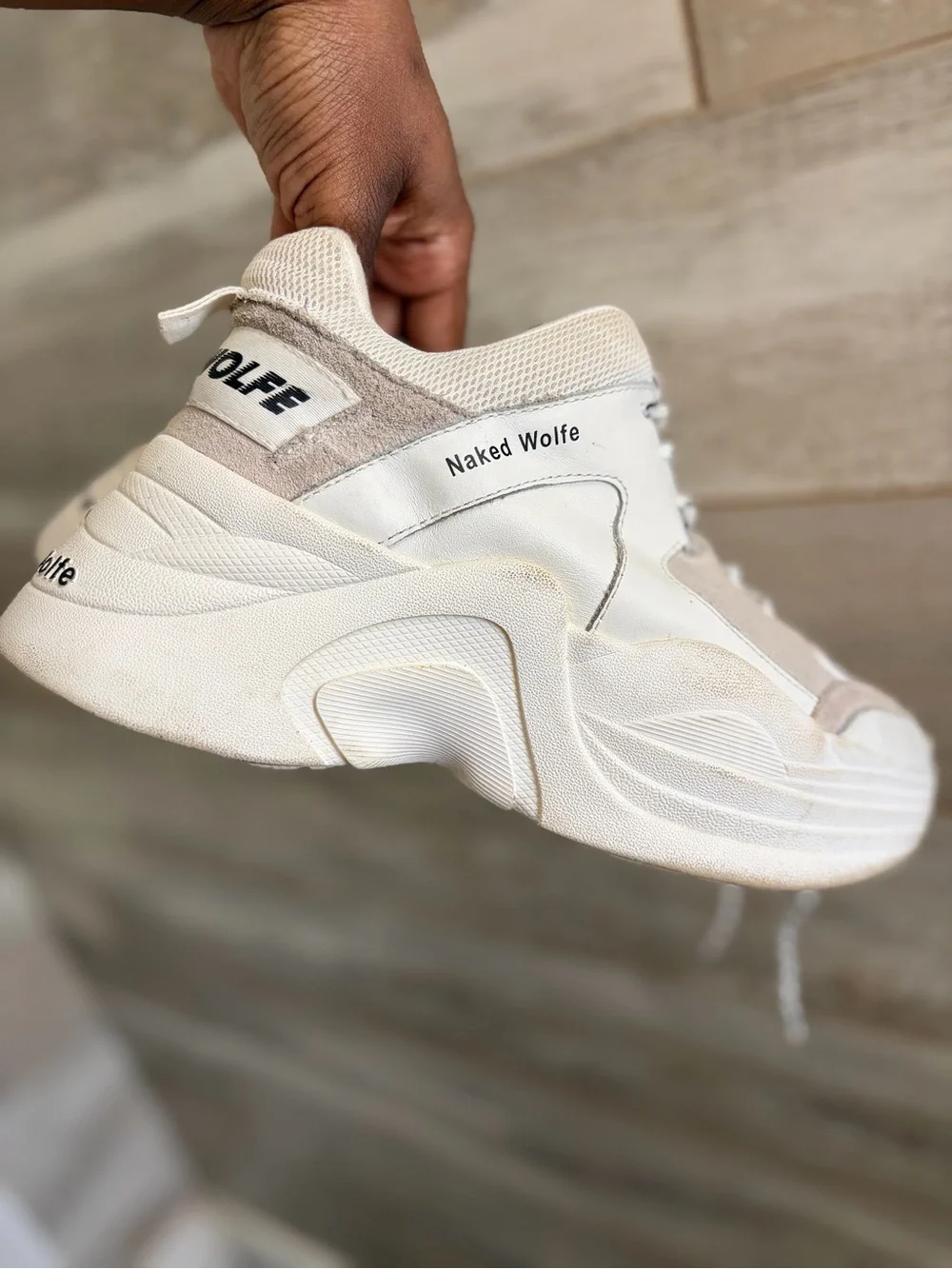 Naked Wolfe Track flatform sneakers w/ a chunky platform sole &- brand lettering